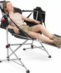 Person lounging in Oversized Hammock Camping Chair With Footrest, Swing Rocker Design, Adjustable Back And Seat Angles