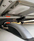 Close-up of Rooftop Tent Mount Bracket Kit with Quick Release Clamp for roof racks and crossbars on SUV, heavy duty installation