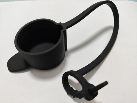 Keep Your Rig Running Smooth With This Hella Reliable EV Charger Plug Port Cover featuring a black rubber J1772 dust cap with a zip tie mount.