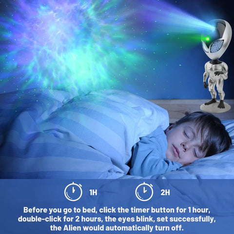 Child sleeping in bed with alien-shaped night light projecting stars on the ceiling, showing one and two-hour timer options.