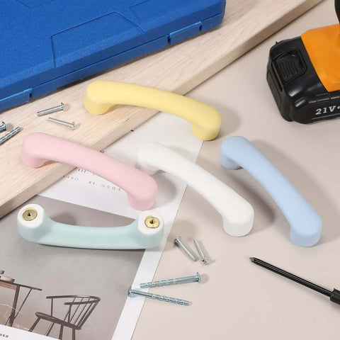 Straight Up Stunning Arch Cabinet Pulls In Bright Yellow Ceramic Drawer Pulls For Kitchen Cupboards And Dressers Big Time Refresh For Your Home Decor Space Today. Different colored ceramic drawer pulls on a wooden surface.