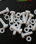 Top Shelf Natural PTFE Hex Head Bolts With Matching Nuts And Washers M6 X 20mm Corrosion Resistant plastic fasteners on black background.