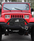 Heavy Duty Winch Cover With American Flag Design waterproof dustproof protection on a red Jeep front view.