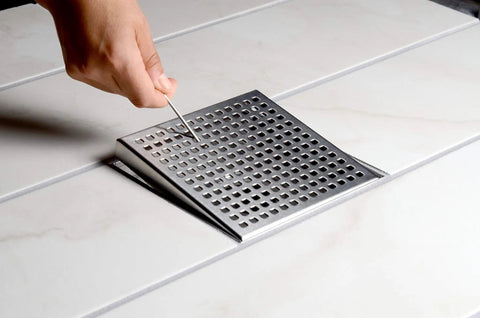 4x4 Inch Square Shower Drain Grate Built In Stainless Steel That Is Corrosion Resistant And Features A Self Cleansing Sloped Channel