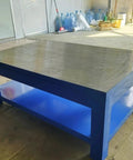 Industrial Heavy Duty Fitters Workbench With An Eight Mil Thick Solid A3 Steel Tabletop Built Like A Tank For Stubborn Mold Assembly and Serious Shop Grind, blue frame, solid steel top.