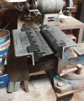 6 Inch Magnetic Vise Mount Metal Brake Bender for DIY metalworking and small box fabrication, installed on a workbench in a garage.