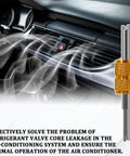 Seventeen Piece Air Conditioning Valve Core Kit For R12 And R134a HVAC Systems With Valve Core Removal Tool displayed on a car dashboard
