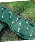 Close-up of 40 Pcs Metal Aerator Shoes Spikes for Lawn and Grass, durable metal spikes on plastic shoe base for soil aeration.