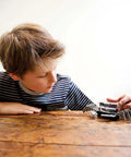 Tabletop Robot Kit For Kids And Teens, DIY Robotics STEM Toy That Builds An Awesome Mechanical Crab, Easy Assembly, Edge Detector Engineering Gift For Boys And Girls, Educational Hands On Fun, boy assembling metal crab on table