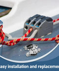 Stainless Steel Boat Pulley Wheel 2 Pack For Kayaks And Sailboats, shown with red rope and cleat on boat deck