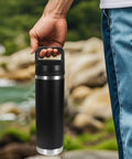 Screw Top Lid Replacement For Rambler Bottle 18 26 36 46 64 Oz No Spill Chug Cap in a person's hand outdoors