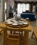 Heavy Duty 30 Inch Lazy Susan Turntable Built Different With Premium Solid Teak Wood Spins Smooth For Effortless 360 Service Making Family Dinners Total Snap Tonight on a dining table with plates.