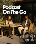 Two people podcasting outdoors with On-The-Go Podcast Kit For iPhone And Android With 2 CastMic Dynamic Mics on a table.