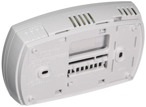 Back view of FocusPro 5000 Non Programmable Thermostat with mounting slots and vents
