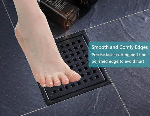 Sleek Six Inch Square Shower Drain Kit In Matte Black 304 Stainless Steel With A Snag Free Hair Catcher To Keep Things Smooth And Totally Zero Clogging Nonsense For Daily Shower Use, showing foot over drain.
