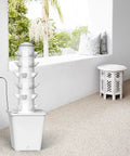 Dope Space Saving Indoor Hydroponic Tower Garden For Up To 30 Herbs And Veggies With Self Watering Pump in room corner