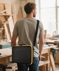 Man carrying DeWalt 20V Max XR Jigsaw Case With Rugged Interior Tray for DCS334B DCS335B in workshop