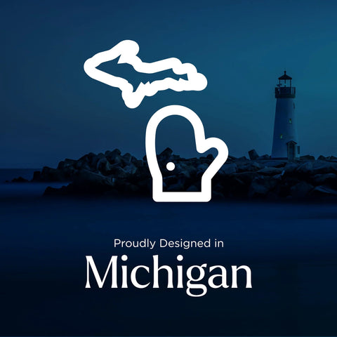 Outline of Michigan with lighthouse in background, text "Proudly Designed in Michigan"