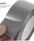 Close-up of a silver roll of Heavy Duty Duct Tape Sealing Tape for Indoor and Outdoor Use Quick Fix Pipe Leaks and Repairs Base Waterproof Cloth Tape You Can Tear by Hand Sticks Fast and Holds Tough for Household Garage and Outdoor Projects, showing tear-by-hand feature.