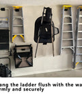 Heavy-Duty Wall Mount Ladder Hooks For Storage And Wheelbarrow Hangers For Garage Walls in use holding bulky items