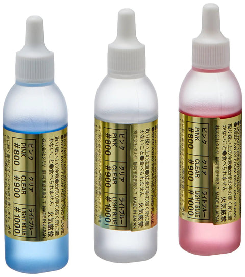 Hard Silicone Damper Oil Set For RC DT02 Chassis And Fighter Buggy Includes 800 900 And 1000 Weight Oils For Dialed Suspension And Smooth Cornering On Any Track, featuring three colored oil bottles.