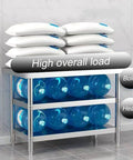Rock Solid Workbench With Adjustable Shelves And Three Tier Open Storage Packing Station with stacked pillows and water bottles.