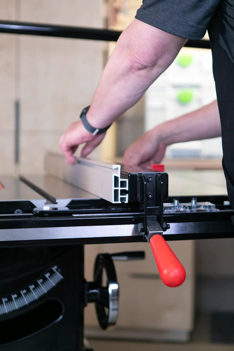 Person adjusting rail on Professional Cabinet Saw With 3 HP Motor And 36 Inch T Glide Advance Rip Fence Rails And Extension Table
