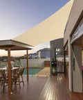Beige 5 By 8 Foot Sun Shade Sail With Straight Edge For Patio And Pergola Outdoor UV Protected HDPE Shade Fabric Rectangle Awning Cloth With Corner D Rings Customizable Size installed over patio