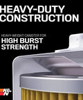 Close-up of Top Notch Premium Oil Filter with wrench off nut for heavy-duty construction and high burst strength