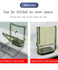 Foldable Kitchen Sink Strainer With Filter Rack And 100 Disposable Fine Mesh Bags shown folding and draining in sink