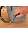 Using 7 Piece SAE Nut Driver Set With Chrome Plated Alloy Shafts Comfortable Grips on a hose clamp in workshop