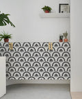 Black Geometric Peel And Stick Wallpaper For Bedroom Accent Walls And Drawer Liner Removable Self Adhesive Vinyl Contact Paper applied to a cabinet.