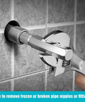 Internal Pipe And Nipple Extractor Set Three Piece Kit being used to remove a pipe nipple from a tiled wall, showcasing wrench action.