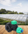 Flat Fan Spray Nozzle For Boom Sprayers With Adjustable Output in front of a greenhouse, showcasing its farm-ready design.