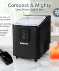 Igloo countertop ice maker, black compact unit with transparent lid and ice inside; includes scoop and basket