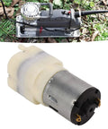 Top Shelf Dc Micro Air Pump And Mini Vacuum Module Rated From 3.7 To 24 Volts running on grass, showcasing a smooth, durable design.