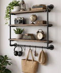 Steampunk style shelf with Ten Pack Three Quarters Inch By Fourteen Inch Black Malleable Iron Pipe Nipples Threaded Both Ends, decor items.