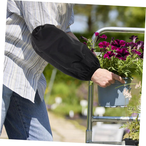 2 Pack Genuine Oilproof Arm Sleeves Kick Grease To The Curb During Kitchen Grinds Or Yard Work Long Ultra Thick Forearm Shields worn while gardening.