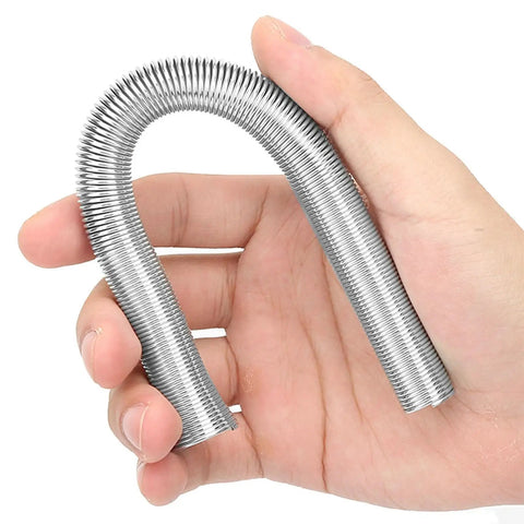 Pro Steel Spring Tube Bender 5 Pcs Set for bending PVC, copper, aluminum, and electrical wire, curved steel spring in hand.