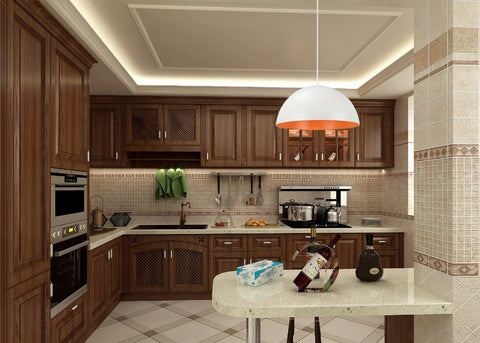 Adjustable One Light Hanging Pendant Light with Matte White Metal Dome Shade above kitchen counter, indoor setting