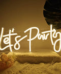 Lets Party Neon Sign Dimmable LED Neon Light For Wall Decor 16x7 Inches Word Sign Warm White Glow on a cozy background