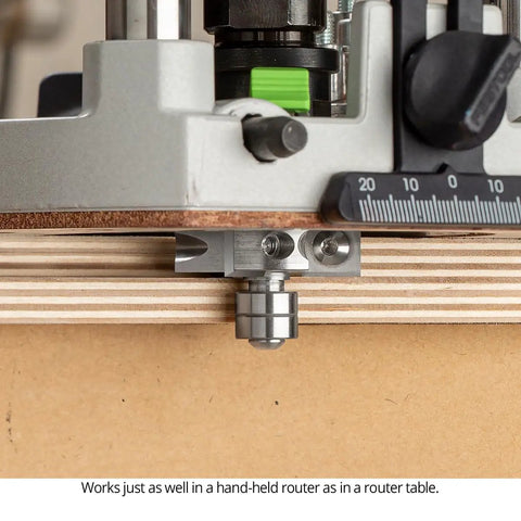 Close-up of Top Shelf Rabbeting Router Bit Kit with twin ball bearing base on plywood, ideal for precise routing tasks.