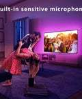 Couple dancing in living room with 12.5ft RGB LED Backlight Strip For 40 To 55 Inch TVs, Bluetooth App Control With Music Sync.