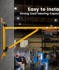 Solid Doppy Wall Mount Jib Crane Heavy Duty Hoist Bracket with yellow carbon steel frame, 180-degree swivel, installed in workshop.