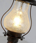 Close-up of No Fuss Dusk To Dawn Outdoor Post Lights with Photocell Sensor, featuring rustic oil rubbed brown lantern with crackle glass.