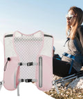 Woman wearing ultra lightweight running hydration vest with adjustable straps bladder compatible chest pack for hiking.