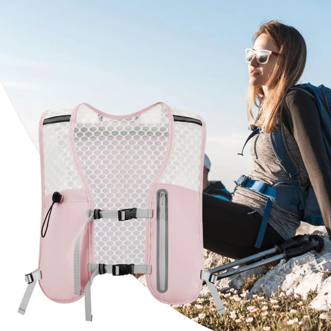 Woman wearing ultra lightweight running hydration vest with adjustable straps bladder compatible chest pack for hiking.
