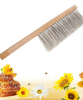 Beekeeping Brush With Natural Horsehair And Wooden Handle For Hive Cleaning over honeycombs and flowers image
