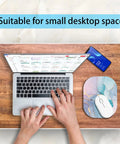 Compact 6x7 Inch Mouse Pad For Laptop And Keyboard Tray, Built For Home Office And Travel, Cyan Blue Marble on desk