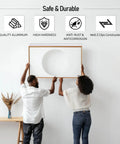 Rock Solid Forty One Inch French Cleat Hanger Kit With Heavy Duty Aluminum Z Clips And Interlocking Wall Mount Brackets Supports Five Hundred Pounds To Securely Anchor Mirrors Pictures And Shelves For A Sleek Floating Vibe No Sweat Install during installation showing two people.